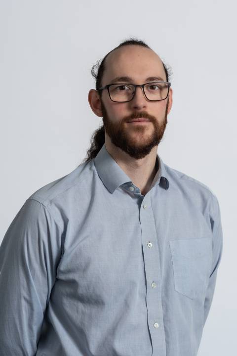 A portrait style photograph of Alex Smith